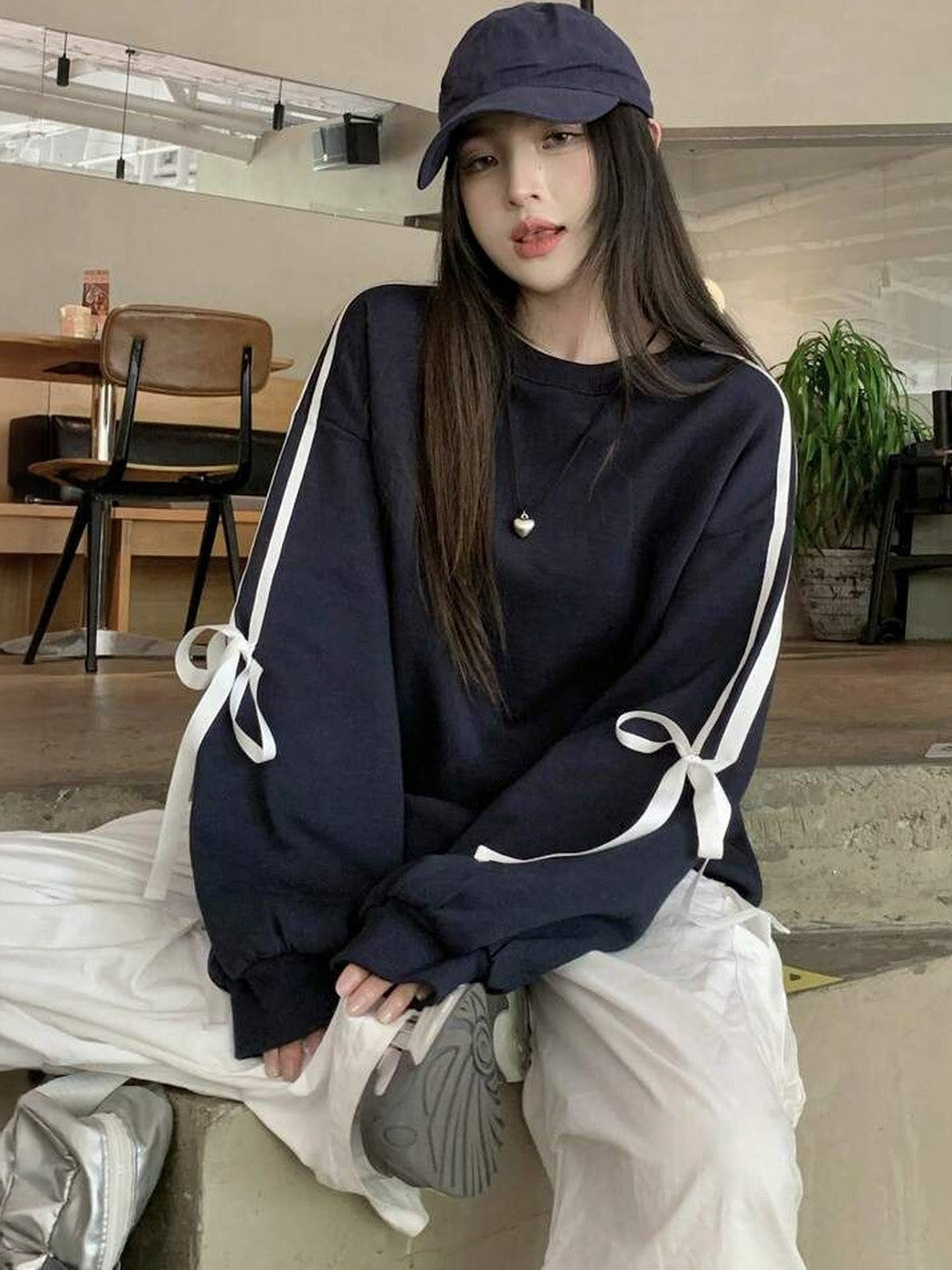 Women With knot styling Full Sleeves And Round Neck Sweatshirt